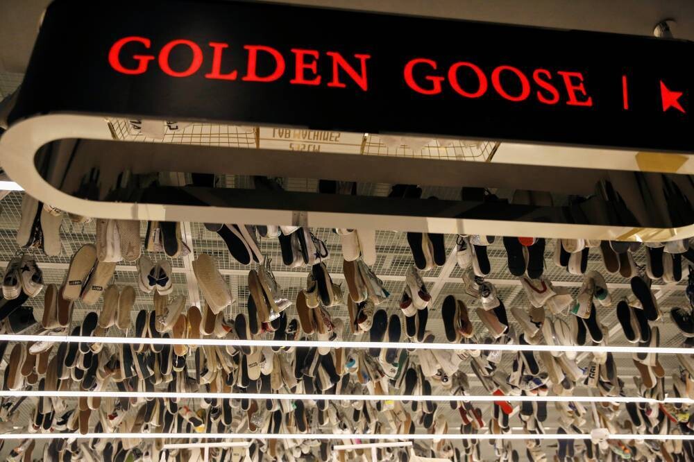 Итальянская компания 'Golden Goose' по производству роскошной спортивной одежды устанавливает цену IPO в 9,75 евро за акцию